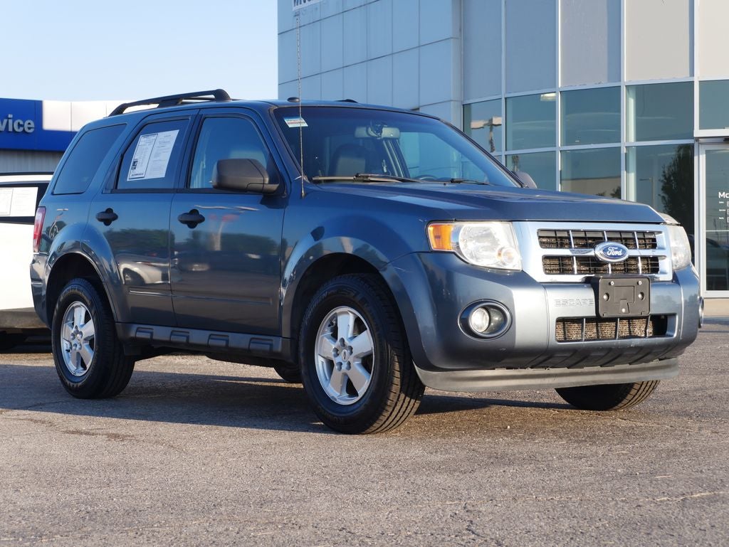 Used 2011 Ford Escape XLT with VIN 1FMCU0D70BKB79457 for sale in Kansas City